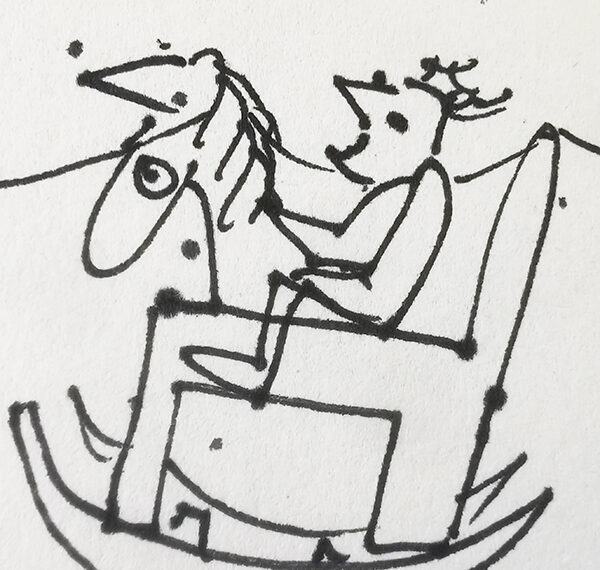 A small child on a rocking horse.